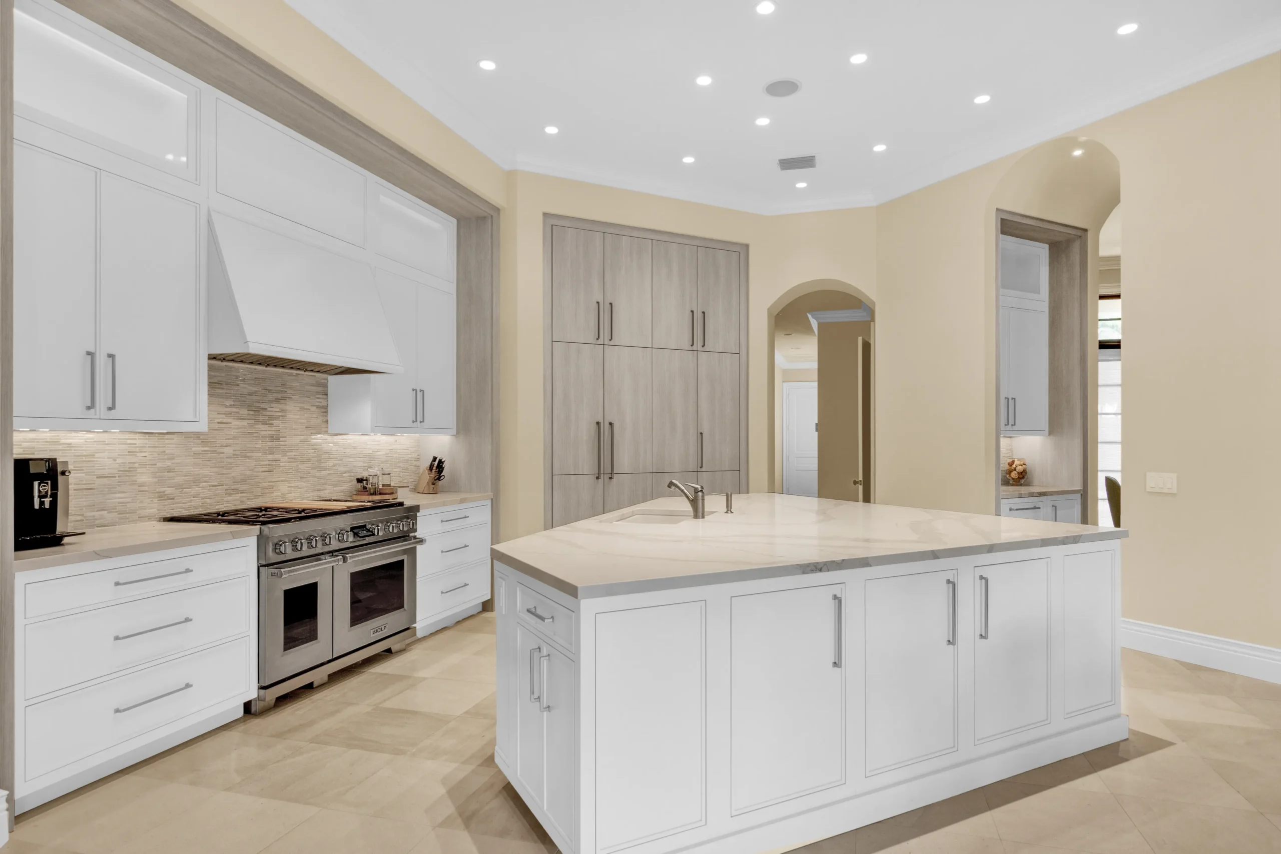 Dawn Wallace designed kitchen and cabinets white and creme